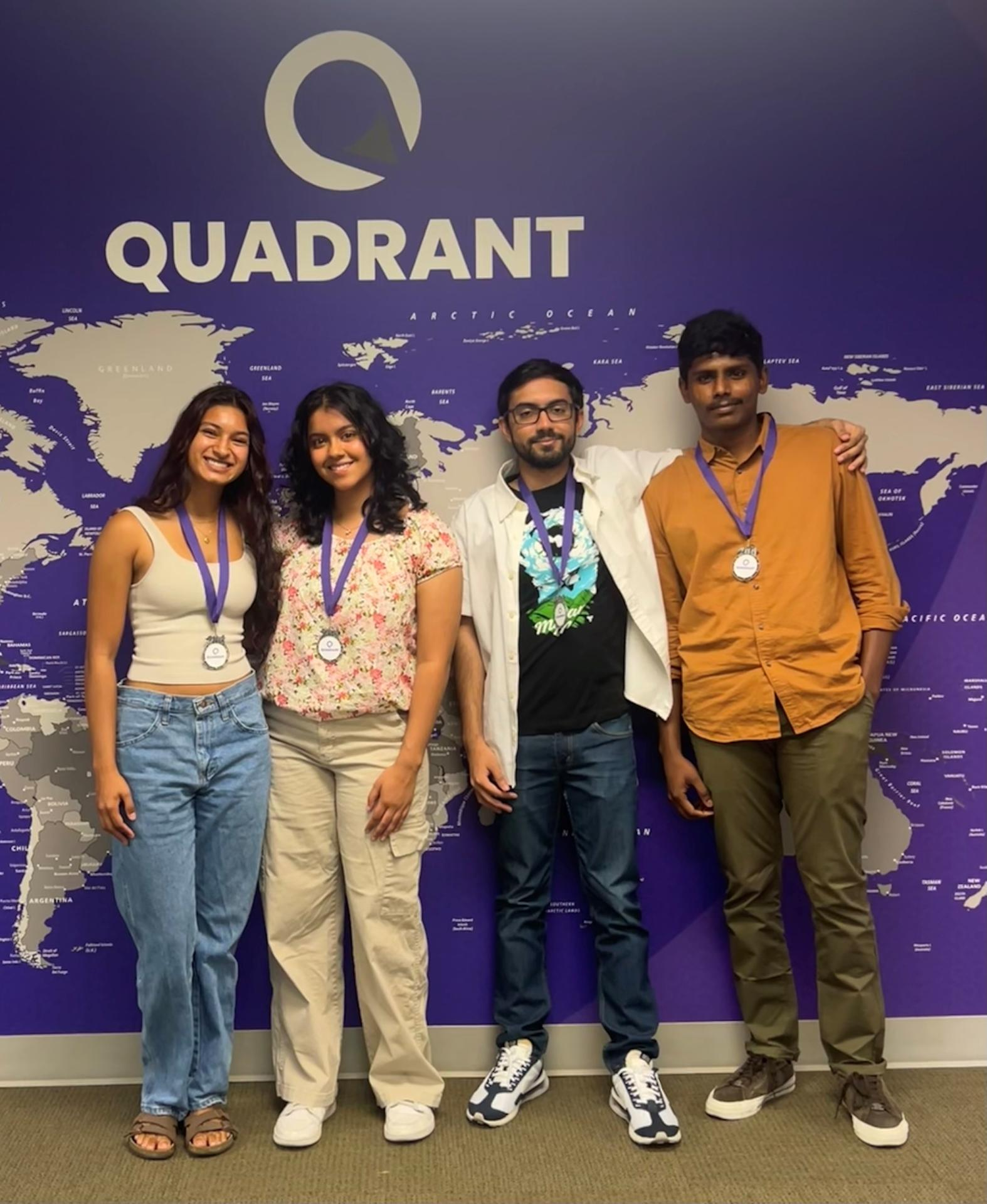 The Cycles internship team at Quadrant Technologies wearing second-place medals